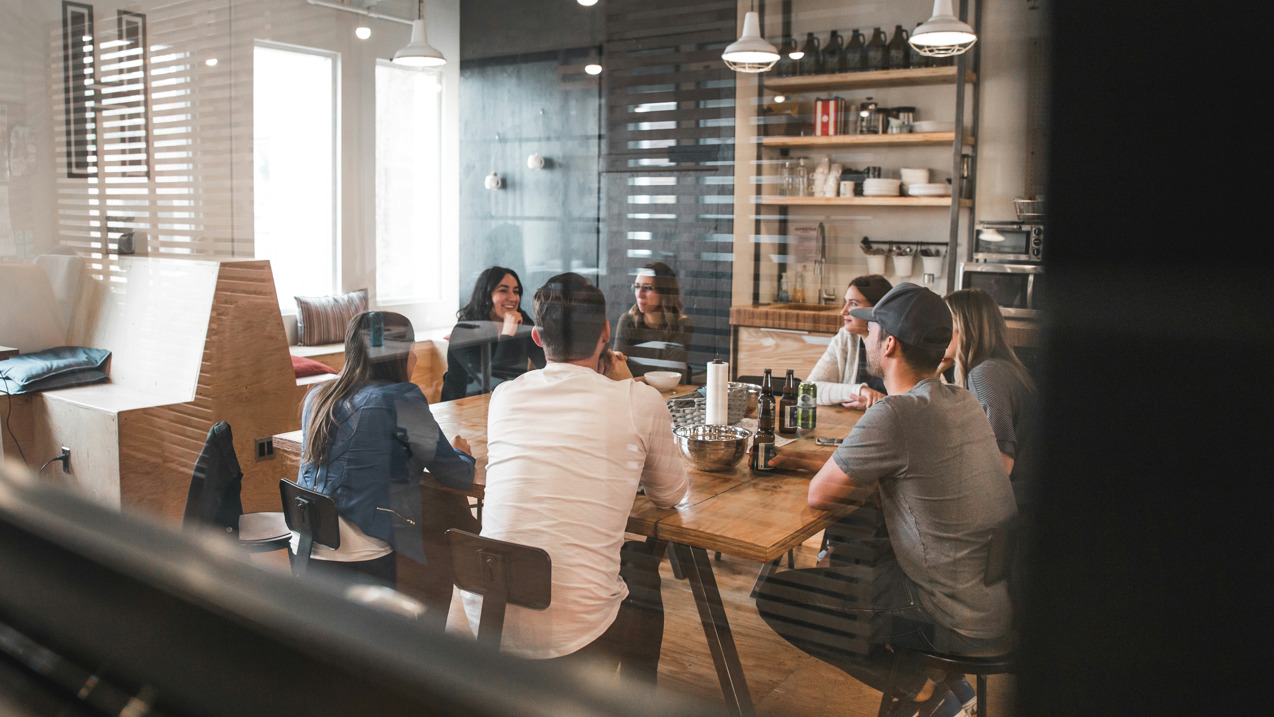 A small business team meeting to plan their bid strategy